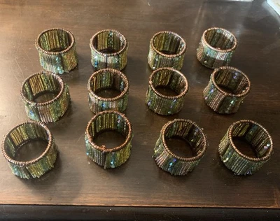 Set di 12 anelli tovaglioli con perline semi bronzo e verde - Immagine 1 di 4