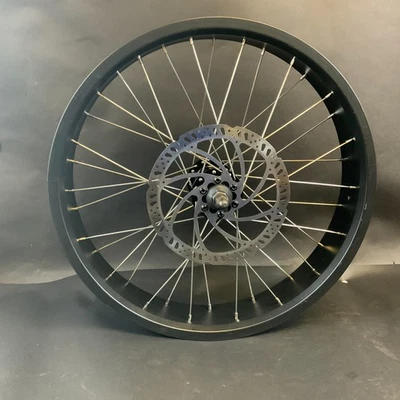 20"X4-1/4 ELECTRIC BIKE FRONT WHEEL RIM WITH ROTOR ($60 OBO) - Image 1 of 4