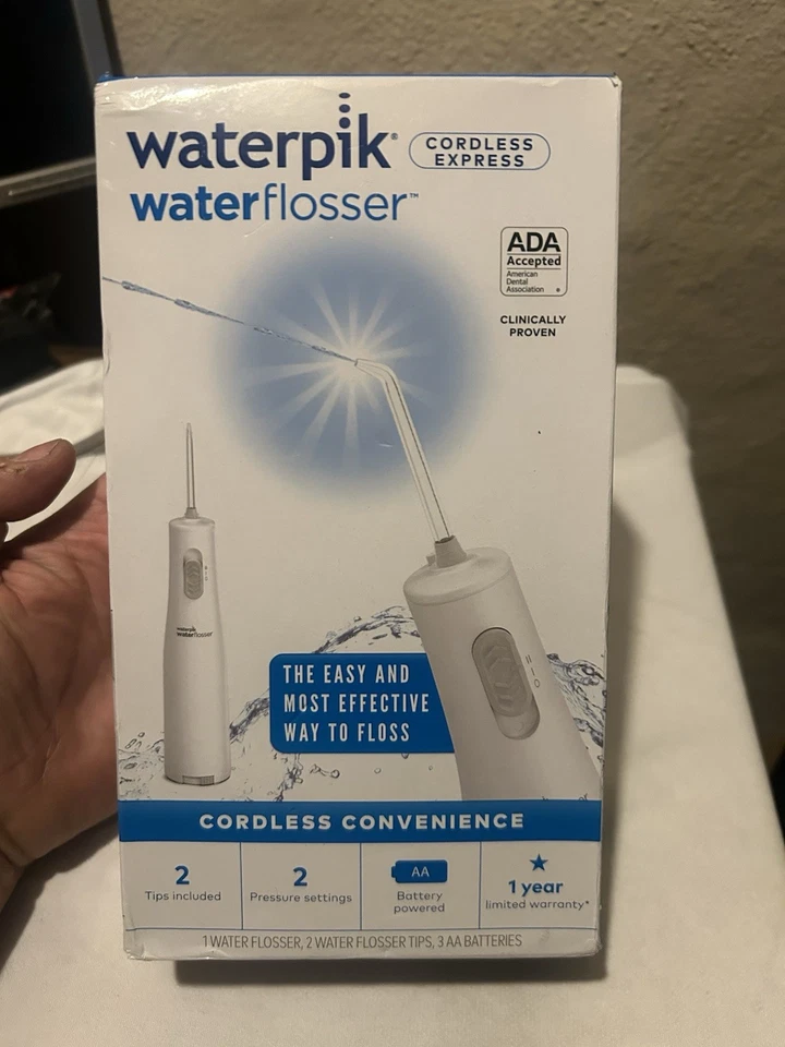 Waterpik Inalámbrico Express Hilo de Agua Nuevo Sellado Foto 1 de 2