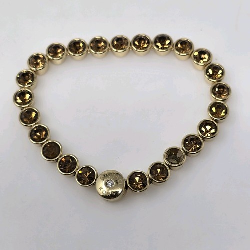 MICHAEL KORS Bracciale Tennis Bagaglio Cristallo Tono Oro Chiusura Magnetica