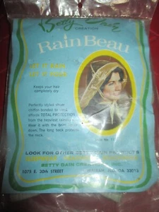 NUEVO EN PAQUETE SOMBRERO DE LLUVIA de nailon Betty Dain RAINBEAU AZUL vintage - Salva a tu bouffant - Años 60 - Imagen 1 de 2
