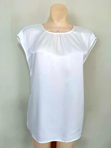 NEU OHNE ETIKETT ZARA DAMEN BLUSE WEISS SATINOPTIK ÄRMELLOS GRÖSSE S #C630 3666 160 250 - Bild 1 von 5