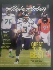 RUSSELL WILSON NFL QUARTERBACK SEATTLE SEAHAWKS ALASKA AIRLINES  SEPT 2014  - Picture 1 of 1