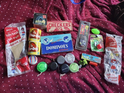 Various Vintage toys/slinky/dominos/checkers/hacky sack/yo-yos/pogs/jax n' ball - Image 1 of 4