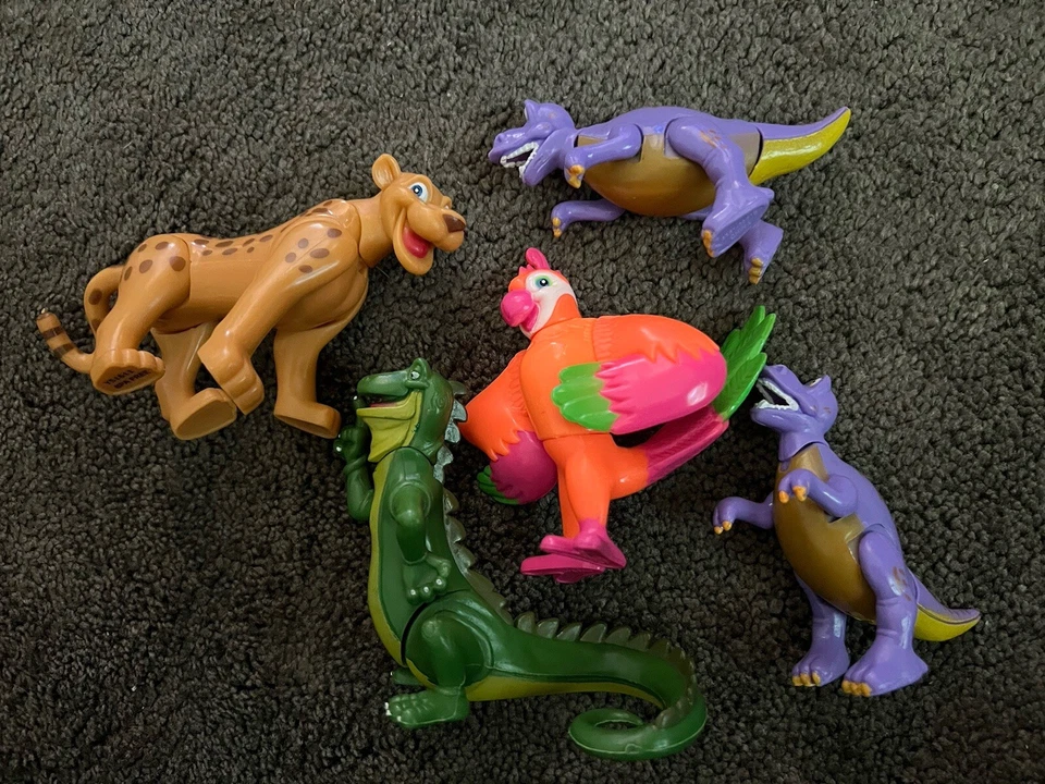 Lote de brinquedos de dinossauro Disney Animals Springs Rainforest Cafe & T-Rex Cafe Dexter - Imagem 1 de 1
