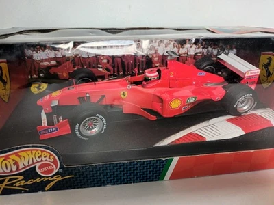 Hot Wheels Ferrari F399 - Eddie Irvine #4 (1999) - Escala 1:18 Fórmula 1 24629 Foto 1 de 4