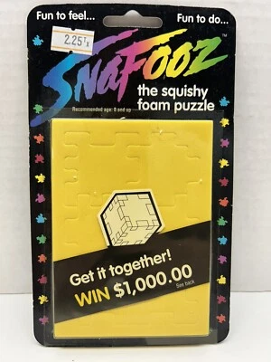 Cubo rompecabezas de espuma Snafooz vintage años 90 amarillo nuevo en paquete Foto 1 de 2