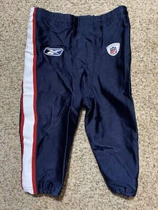 REEBOK AUTHENTIC HOUSTON TEXANS FOOTBALL PANTS Sz. 34 SHORT NEW NAVY - Picture 1 of 6
