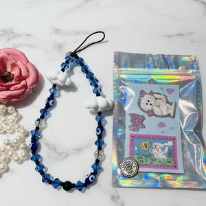 STRING TING LONDRES CRISTAL SWAROVSKI MAUVAIS YEUX BRACELET TÉLÉPHONE BRACELET - Photo 1 sur 6