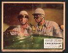Checkpoint Lobby Card Anthony Steel Driving A Race Car At Gunpoint