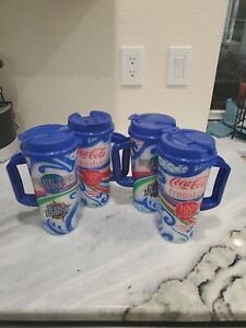 Universal Studios Florida Coca-Cola Freestyle Refillable Cup Mug Lid Set of 4