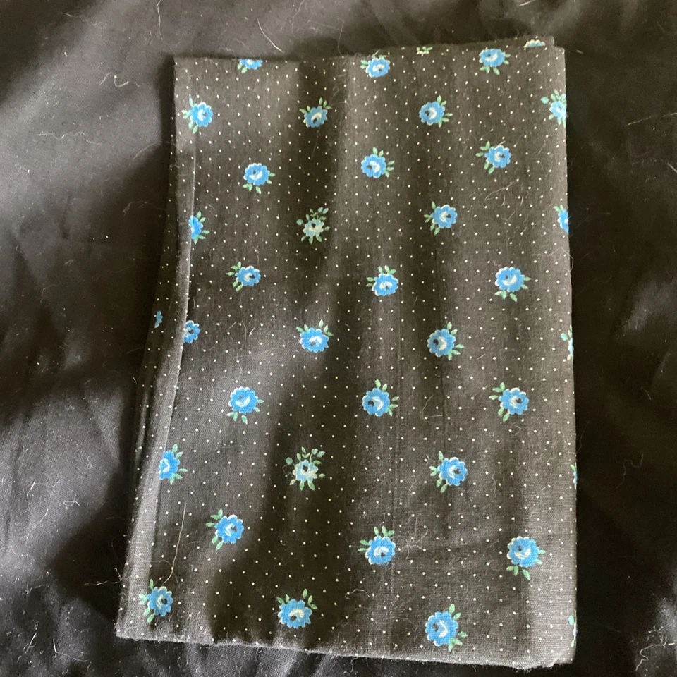 Small Blue Flowers  on Black 100% cotton fabric  7/8 + Yard x 44” - Image 1 of 1
