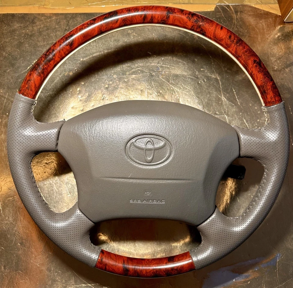 Volante Toyota Land Cruiser Serie 100 Marrón Lexus LX470 Madera Perforada Foto 1 de 4