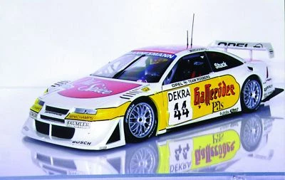 1:18 UT Models Opel Calibra '96 #44 Stuck 'Old Spice' - Image 1 of 2