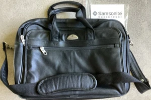 PORTEFEUILLE EN CUIR DE VACHETTE SAMSONITE RÉSISTANT AU MONDE NEUF DANS SA BOÎTE #921025/NOIR 16"X11,5"X 5,5 - Photo 1/5