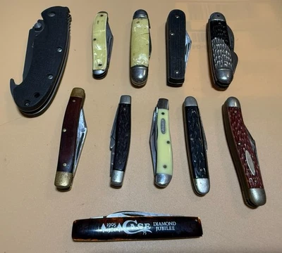 Estuche de 11 cuchillos plegables vintage Imperial Ulster Camillus Remington Foto 1 de 4