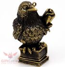 Solid Brass Amber Figurine of a bird Old Raven perched on books scroll IronWork