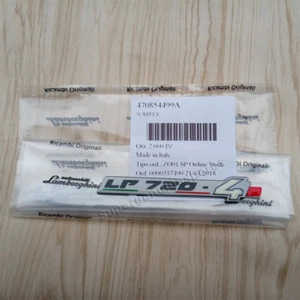 Adhesiones decorativas genuinas Lamborghini LP720-4 emblema insignia 1 pieza 470854499A nuevo - Imagen 1 de 5
