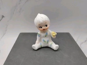 Vtg Baby Porcelain Figurine Wearing Blue Flowered Pajamas Holding Daffodil READ - Picture 1 of 14