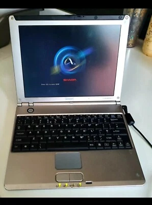 Classic Sharp NoteBook Computer PC-MM1110 Slim Laptop Collectable  - Image 1 of 4