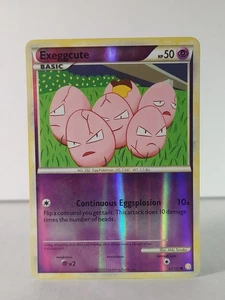 Exeggcute - HeartGold y SoulSilver - 63/123 - Juego de cartas coleccionables Pokémon - Holograma inverso - A - Imagen 1 de 5