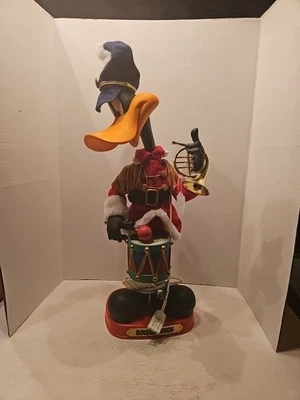 Motionette animado vintage 1997 Looney Tunes Pato Lucas "DEBE VER NOTAS DAÑOS" Foto 1 de 4