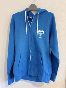 Stussy World Tour Blue Hoodie Sweatshirt **Size Medium** NWOT Rare - Picture 1 of 10