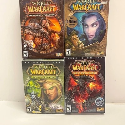 4 juegos vintage de World of Warcraft en caja y 3 paquetes de expansión sin probar Foto 1 de 4