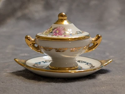 Limoges F.M. vintage Mini sopera de porcelana dorada con tapa y plato para servir Foto 1 de 4