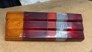 GENUINA UNIDAD DE LUZ TRASERA CONDUCTOR FORD ESCORT L/GL/GHIA/1600i Mk3 81ag13a603aa l1 - Imagen 1 de 6