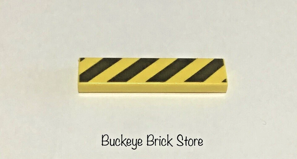 LEGO Tile 1 x 4 with Black and Yellow Danger Stripes Pattern 2431p52 - Image 1 of 1