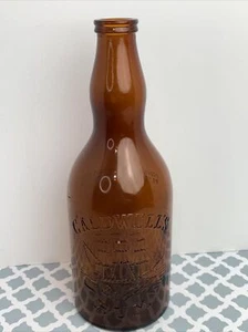 Brown Amber  Glass Caldwell's Rum  10" Tall  Ornate Embossed Schooner 1948 D-376 - Picture 1 of 9