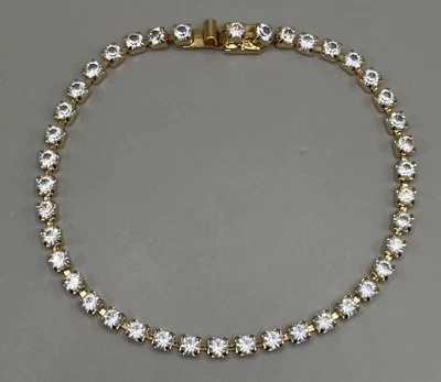 "Pulsera de tenis Monet para mujer tono dorado pedrería de metal 7,5""" Foto 1 de 4