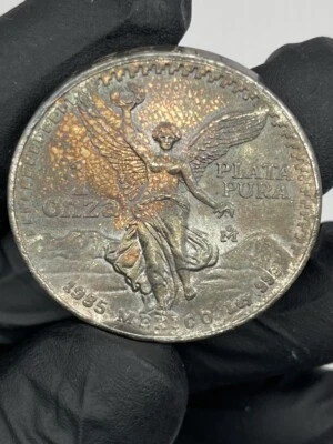 1985 1 Oz 999 Libertad Beautiful Toning Notice The Orange, Yellow And Blues #18 - Image 1 of 2