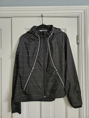 Chaqueta con capucha a rayas impermeable Athleta Run On cierre de cremallera mediana para mujer Foto 1 de 4