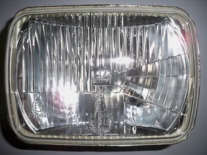 DAIHATSU HONDA Civic NISSAN Cherry TOYOTA Celica Hiace - Optique phare H4 HELLA - Picture 1 of 2