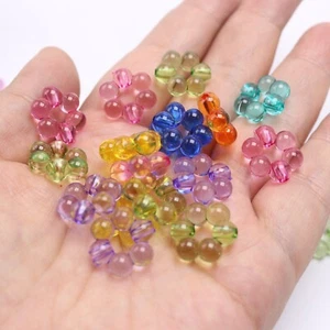 60 cuentas florales huecas acrílicas transparentes de color mezclado para espaciadores de pulsera - Imagen 1 de 6