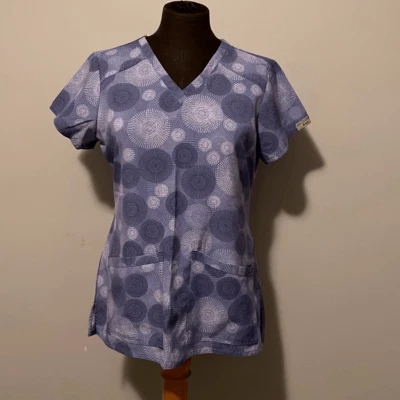 Med Couture Women's Blue Circular Pattern V-Neck Short Sleeve Scrub Top - Image 1 of 4