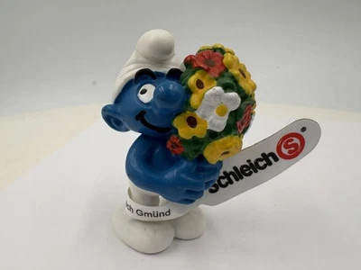 Schlumpf Schlümpfe 20469 Schlumpf mit Blumenstrauß - Bild 1 von 2