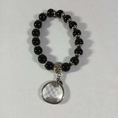 Brazalete elástico colgante facetado transparente con cuentas negras tono plata Chicos Foto 1 de 4