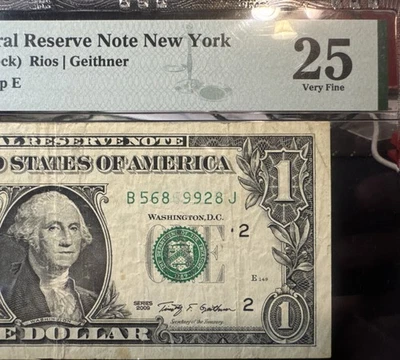 😎 2009  $1 FRN -Insufficient Inking of Digit in UR Serial Number - PMG 25 - Image 1 of 4