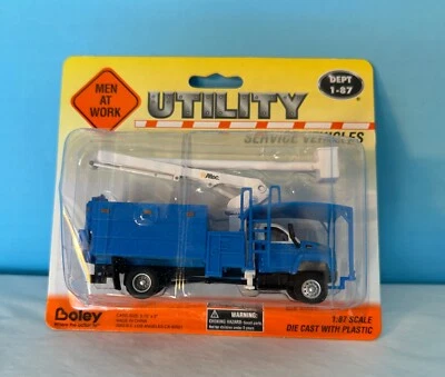 Boley #3024-00 Blue GMC Tree trimmer Boom Truck w/Altec Moving Arm - Image 1 of 4