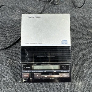 Reproductor digital compacto de CD portátil vintage realista CD3000 gris negro con base - Imagen 1 de 9