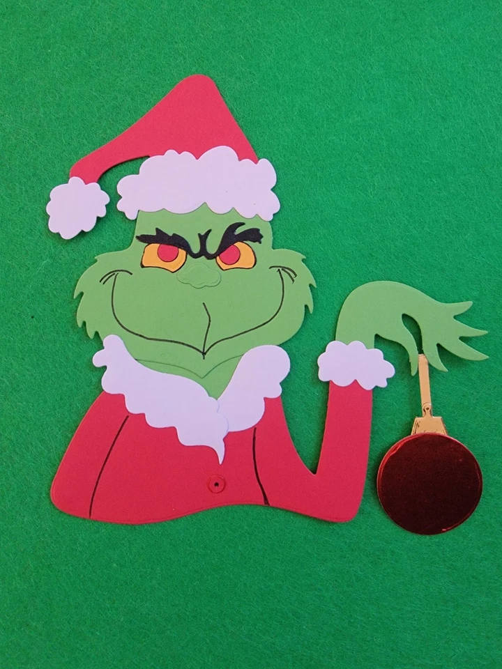 Grinch grande de Navidad con cartulina de bola de vacaciones troquelada para álbum de recortes Foto 1 de 1