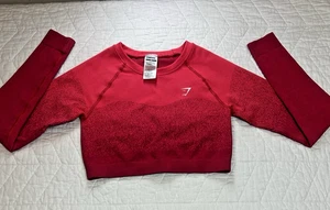 Gymshark Vital Seamless 2.0 langärmliges bauchfreies Oberteil leuchtendes Pink Damengröße Small - Bild 1 von 6
