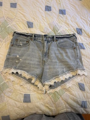 Pantalones cortos de mezclilla para mujer Free People talla 29 ribete de encaje corte lavado claro Foto 1 de 4