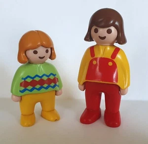 PLAYMOBIL 2 FIGUREN GELB UND ROT SORTIMENT 1 2 3... - Bild 1 von 1