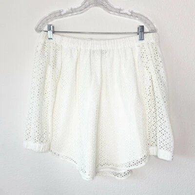 Top con ojales fuera del hombro Central Park West XS Foto 1 de 4