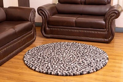 Create a Chic and Timeless Look with Our Handmade Black, White, Gray & Brown Rug - Image 1 of 4