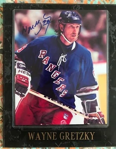Wayne Gretzky signed 8X10 Photo in a 10X13 Black Marble Plaque **PRICE REDUCED** - Picture 1 of 2